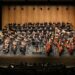 Members of the FM Youth Symphony play alongside the FM Symphony Orchestra on the song, "Rainbow Body" by Christopher Theo Fanidis, the first song of Saturday night's concert on Jan. 18, 2025, at Festival Concert Hall, NDSU.