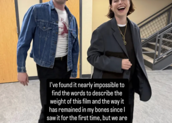 two individuals in a hallway discussing a film and sharing emotional reflections