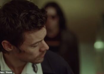 Fans have gone wild as they speculated Harry Style's new music video is inspired by David Bowie's I'm Afraid of Americans