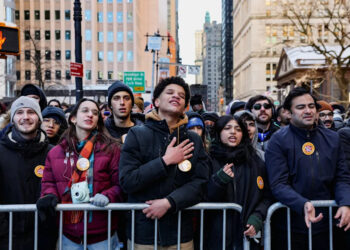 People attend a block party to mark the inauguration of Zohran Mamdani as the new Mayor of New York City, at Canyon of Heroes along Broadway, in New York City on Jan. 1, 2026.