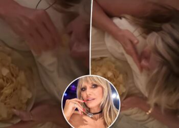 Heidi Klum gets a butt massage while eating potato chips