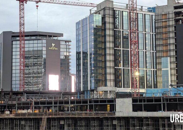 Images: Another sizable Centennial Yards building has topped out