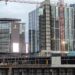 Images: Another sizable Centennial Yards building has topped out