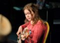 Clara Smith ’26 rehearses a Somali love song for a collaborative performance at the Faribault Paradise Center for the Arts. Photo by Rehanna Kheshgi