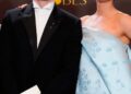 Paul Mescal, left, and Jessie Buckley pose in the press room with the award for best motion picture - drama for "Hamnet during the 83rd Golden Globes on Sunday, Jan. 11, 2026, at the Beverly Hilton in Beverly Hills, Calif. (AP Photo/Chris Pizzello)