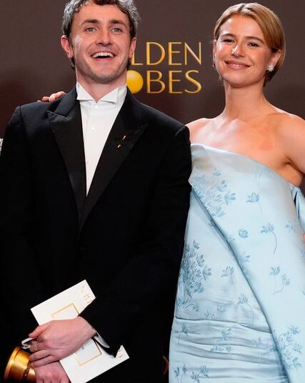 Paul Mescal, left, and Jessie Buckley pose in the press room with the award for best motion picture - drama for "Hamnet during the 83rd Golden Globes on Sunday, Jan. 11, 2026, at the Beverly Hilton in Beverly Hills, Calif. (AP Photo/Chris Pizzello)