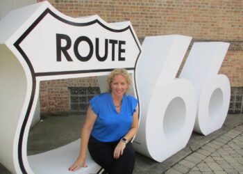 New Joliet Cultural Affairs Director Ann Sylvester poses for a photo at the Route 55 sculpture outside the Joliet Area Historical Museum in downtown Joliet. Aug. 15, 2025
