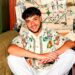 Junior andre sat down in white trousers