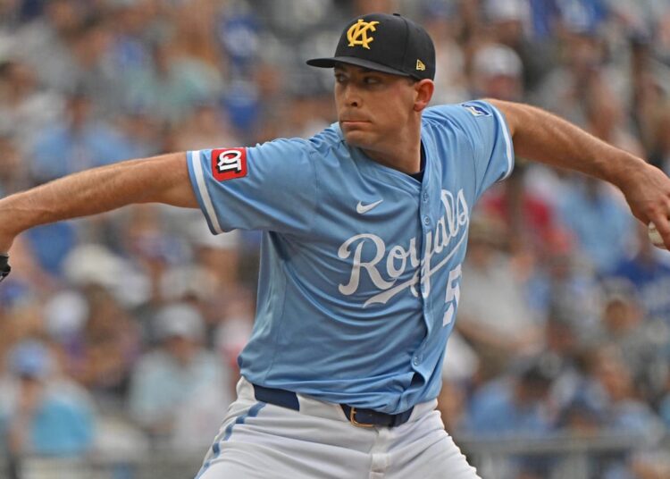 Jun 29, 2025; Kansas City, Missouri, USA;  Kansas City Royals starting pitcher Kris Bubic (50) throws a pitch in the first inning against the Los Angeles Dodgers at Kauffman Stadium. Mandatory Credit: Peter Aiken-Imagn Images