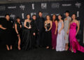 The cast and crew of Netflix's animated hit ″KPop Demon Hunters″ (2025) pose for a photo after the film received Best Animated Feature at the 31st Critics Choice Awards at The Barker Hanger in Santa Monica, California, on Jan. 4. From left is Audrey Nuna, Rei Ami, Ejae, Mark Sonnenblick, Chris Appelhans, Maggie Kang, Michelle Wong, Arden Cho, May Hong and Yoo Ji-young. [AP/YONHAP]