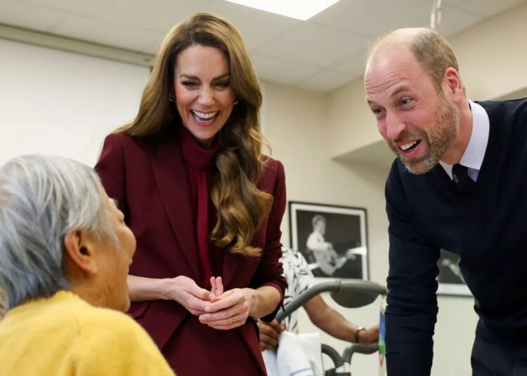 William and Kate share a joke with a patient in the therapy gym at the hospital