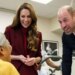 William and Kate share a joke with a patient in the therapy gym at the hospital