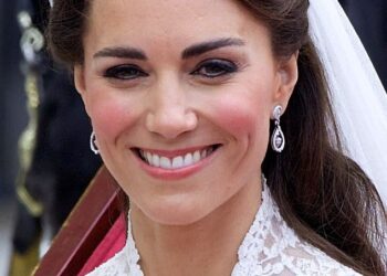 The exquisite but noticeably petite Cartier halo tiara was deemed by the institution as the one most suited for what everyone knew would be a long jewellery wearing career