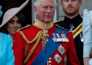 Prince Harry could invite his father King Charles to open his Invictus Games in the UK next year (pictured: the pair with Meghan Markle, left, in 2018) - and the monarch could offer to put a roof over their head this summer