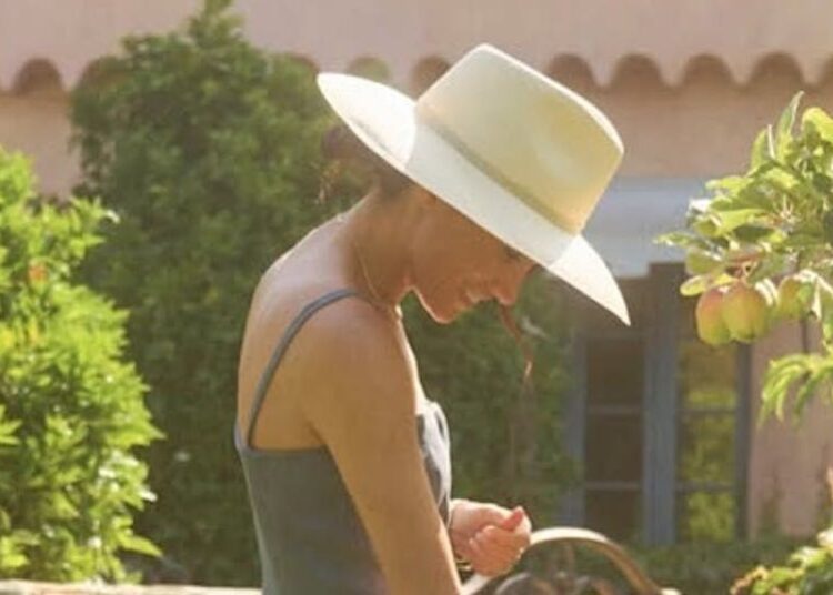 Meghan Markle Celebrates 'Simplicity' in Blue Sundress and Wide-Brimmed Hat