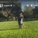 Couple sharing an embrace in a park.