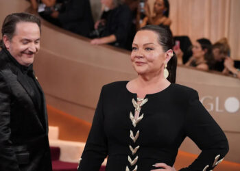 Jordan Strauss/Invision/AP - PHOTO: Ben Falcone, left, and Melissa McCarthy arrive at the 83rd Golden Globes, Jan. 11, 2026, at the Beverly Hilton in Beverly Hills, Calif.