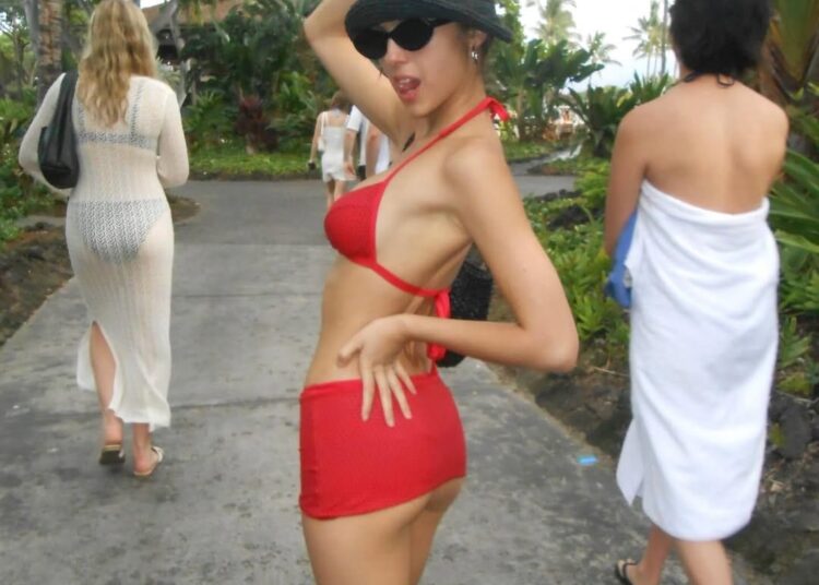 Olivia Rodrigo goes bold in red bikini and mini skirt, and fans are convinced she teased “The Album”