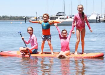 Siblings Makaela (10), Lewis (4) Chelsea (7) and Tara (9) Thornton are enjoying the sunshine on Matilda Bay.