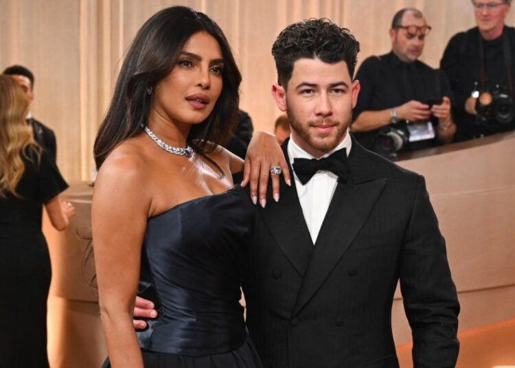 Priyanka Chopra, Nick Jonas Coordinate in Dark Hues for 2026 Golden Globes