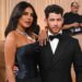 Priyanka Chopra, Nick Jonas Coordinate in Dark Hues for 2026 Golden Globes