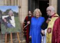 Queen Camilla arrives at Dame Jilly Cooper's memorial