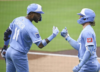 Kansas City Royals third baseman Maikel Garcia (11) and shortstop Bobby Witt Jr. (7). © Denis Poroy-Imagn Images