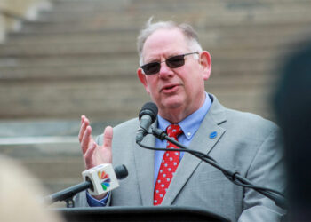 Kansas House Speaker Dan Hawkins speaks at a rally in Topeka in January.