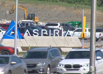 Cars drive by the Aspiria Campus located in Overland Park, Kansas. (Spectrum News)