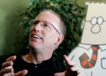 Scott Adams, creator of the comic strip Dilbert, talks about his work at his studio in Dublin, Calif., on Oct. 26, 2006. (AP Photo/Marcio Jose Sanchez)
