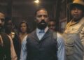 This image released by Warner Bros Pictures shows Michael B. Jordan, foreground from left, Michael B. Jordan and Omar Benson Miller in a scene from "Sinners." (Warner Bros. Pictures via AP)
