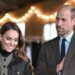 Striking Photo of Kate Middleton Laughing While Will Drinks Beer
