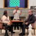 Image may contain Judit Polgr Alec Baldwin Rory Kennedy Adult Person Conversation Interview Chess and Game