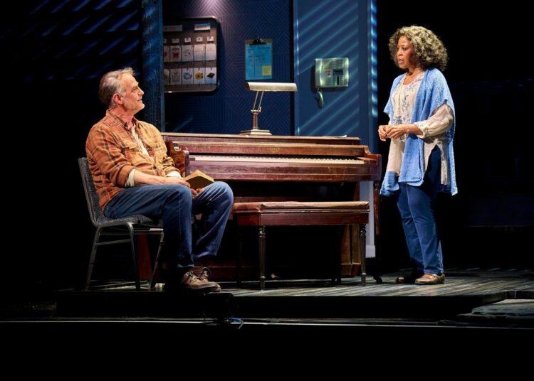 Beau Gravitte (Older Noah) and Sharon Catherine Brown (Older Allie).