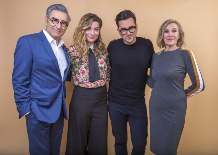 FILE - Eugene Levy, from left, Annie Murphy, Daniel Levy and Catherine O'Hara cast members in the series "Schitt's Creek" pose for a portrait during the 2018 Television Critics Association Winter Press Tour in Pasadena, Calif., on Jan. 14, 2018. (Photo by Willy Sanjuan/Invision/AP, File)