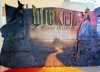 Photo shows a cardboard cut-out advertising the latest 'Wicked' movie, starring Cynthia Erivo and Ariana Grande