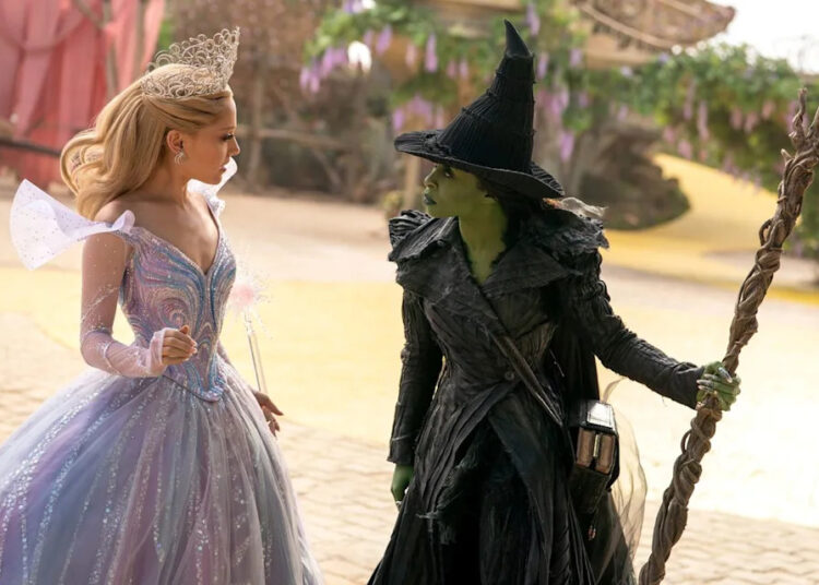 Giles Keyte/Universal Pictures Ariana Grande as Glinda and Cynthia Erivo as Elphaba in Wicked For Good.