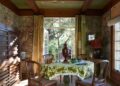 Image may contain Dining Table Furniture Table Architecture Building Dining Room Indoors Room and Lamp