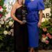 Nodding to her regal heritage at Magic Millions, Zara wore this royal blue midi dress with puff sleeves and flattering embellishment across the bodice