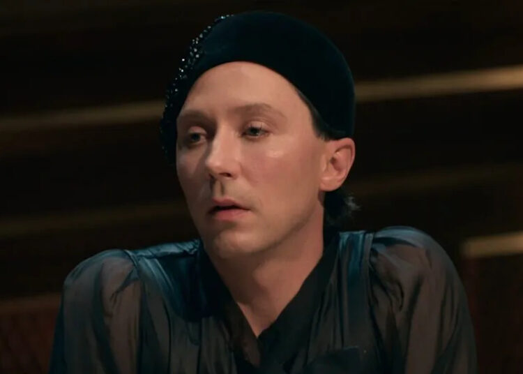 Johnny Weir looking concerned at the Round Table.