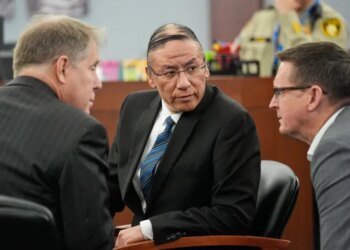 Nathan Chasing Horse, center, confers with attorneys as he appears in court for his trial on charges of sexually abusing Indigenous women and girls Tuesday, Jan. 20, 2026, in Las Vegas. (AP Photo/John Locher)