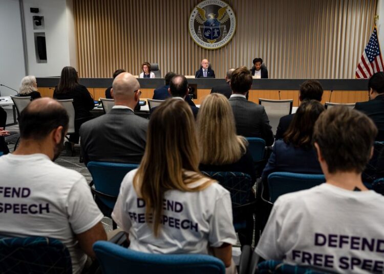 Federal Communications Commission commissioners Anna Gomez, Brendan Carr and Olivia Trusty during a meeting at the FCC headquarters in Washington, DC, on September 30, 2025.