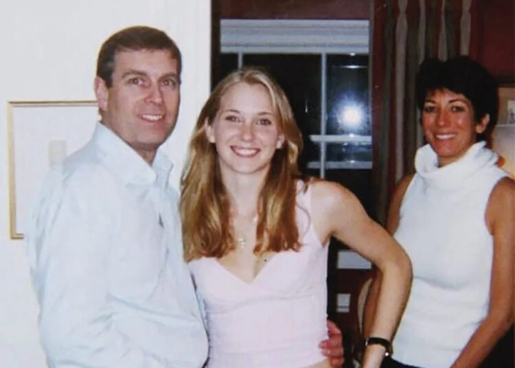 An undated handout photo taken at an undisclosed location and released on Aug. 9, 2021 by the United States District Couty for the Southern District of New York shows (left to right) Prince Andrew, Virginia Giuffre, and Ghislaine Maxwell posing for a photo.