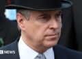 Prince Andrew in a top hat at Ascot in 2011
