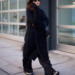 person walking on a sidewalk in urban setting