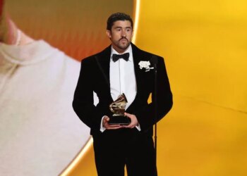Bad Bunny accepting the award for Best Musica Urbana Album.