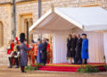 A soldier talks to King Charles