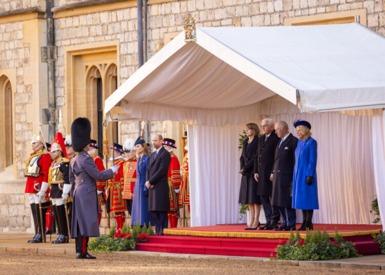 A soldier talks to King Charles