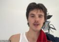 Cruz Beckham has shared a behind-the-scenes look at his latest song as he sported bandages after chopping his pinky finger off