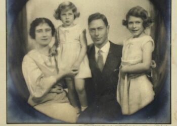 An unearthed handwritten letter by a young Queen Elizabeth II (pictured right, with her parents and sister Margaret), to Royal Lodge's head housemaid is set to fetch thousands at an auction